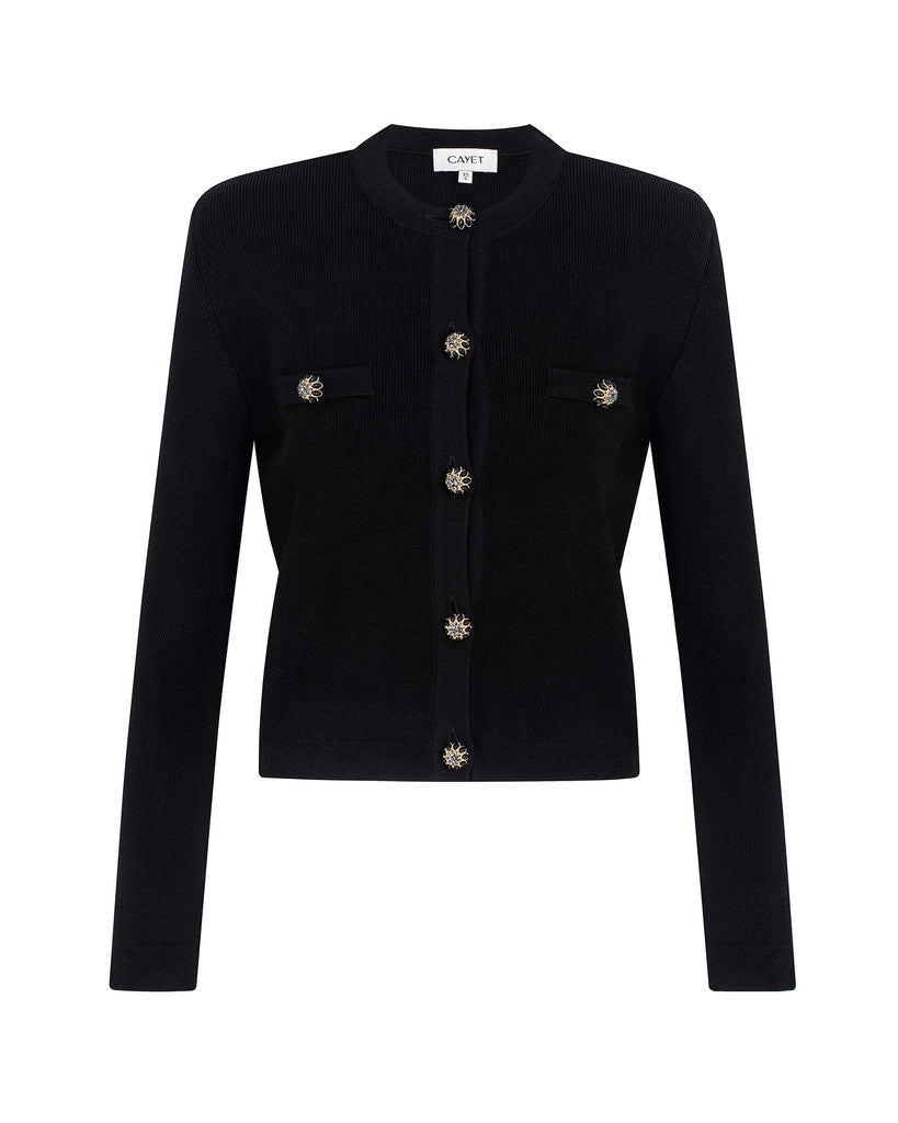 Black jacket with decorative buttons on a white background
